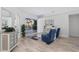 Bright living room with access to the lanai with pool and spa at 193 Beeney Se Rd, Port Charlotte, FL 33952