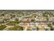 Stunning aerial perspective of a waterfront neighborhood, showcasing the property's location and access to the canal at 164 Chelsea Nw Ct, Port Charlotte, FL 33952