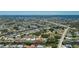 Waterfront home with a private dock, pool, serene surroundings, and access to waterways at 164 Chelsea Nw Ct, Port Charlotte, FL 33952