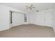 Spacious bedroom with multiple windows offering natural light and outdoor views at 164 Chelsea Nw Ct, Port Charlotte, FL 33952