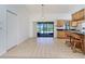Bright dining area with tile flooring and sliding glass doors to the pool area at 164 Chelsea Nw Ct, Port Charlotte, FL 33952