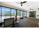 Inviting sunroom with access to the pool area through sliding glass doors at 164 Chelsea Nw Ct, Port Charlotte, FL 33952