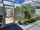 Enclosed patio features a screened-in area, perfect for plants and relaxation, with lots of sunlight at 3300 Loveland Blvd # 3303, Punta Gorda, FL 33980