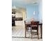 An eat-in kitchen area with a brown wooden table at 4363 Sansedro St, Port Charlotte, FL 33948
