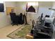 Functional home office space with natural light and ample room for multiple workstations at 4363 Sansedro St, Port Charlotte, FL 33948