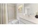 Clean bathroom featuring a walk-in shower, a modern vanity, and neutral colors at 5481 Burgner St, Port Charlotte, FL 33981