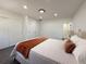 Comfortable bedroom featuring new floors, closet, an ensuite bath, and a queen bed at 1100 Belkton Ave, Port Charlotte, FL 33948