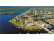 Waterfront homes with private docks and beautiful landscaping in a desirable community at 17557 Ohara Dr, Port Charlotte, FL 33948