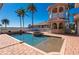 Beautiful backyard with pool, spa, outdoor kitchen and tower at 17557 Ohara Dr, Port Charlotte, FL 33948