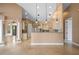 Gourmet kitchen features custom cabinets, granite countertops, and stainless steel appliances at 17557 Ohara Dr, Port Charlotte, FL 33948