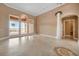 Open living area with a wall of windows and a view of the water, creating a seamless blend of indoor and outdoor at 17557 Ohara Dr, Port Charlotte, FL 33948