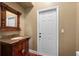 Elegant powder room with decorative vanity and granite countertop at 17557 Ohara Dr, Port Charlotte, FL 33948