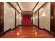 Home theater with raised seating area, tray ceiling, and elegant trim at 17557 Ohara Dr, Port Charlotte, FL 33948