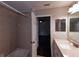 This bathroom has a shower and vanity with modern fixtures at 5275 Layton Dr, Venice, FL 34293
