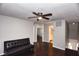 This upstairs bonus room features wood floors and natural light at 5275 Layton Dr, Venice, FL 34293