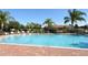 Large, sparkling community pool with lounge chairs, perfect for enjoying sunny days and relaxing outdoors at 5275 Layton Dr, Venice, FL 34293