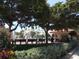 Scenic park view with benches, landscaping, and a pavilion for community gatherings and recreation at 5275 Layton Dr, Venice, FL 34293