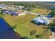 Aerial view of the home and yard, situated on the canal at 102 Annapolis Ln, Rotonda West, FL 33947