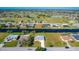 Aerial view of the house on a waterfront lot with access to the canal and community at 102 Annapolis Ln, Rotonda West, FL 33947