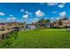 Gorgeous backyard with lush green grass and canal with boat lift, perfect for outdoor enjoyment at 1380 Willet Ct, Punta Gorda, FL 33950