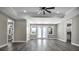 Bright living space offering an island kitchen with stainless steel appliances at 16305 Branco Dr, Punta Gorda, FL 33955