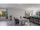 Dining area with tile flooring, neutral walls, and plenty of natural light at 2784 Dode Ave, North Port, FL 34288
