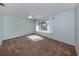 Bright bedroom features a ceiling fan and natural light at 3341 Briant St, North Port, FL 34287