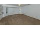 Cozy bedroom with neutral carpet, natural light, and a ceiling fan, perfect for relaxation at 3341 Briant St, North Port, FL 34287