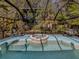 The screened-in pool area has a built-in hot tub and patio furniture at 3341 Briant St, North Port, FL 34287
