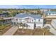 Bright waterfront home with a metal roof, balconies, covered parking, and easy canal access at 4297 Nettle Rd, Port Charlotte, FL 33953
