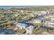 Stunning aerial view of the waterfront property with boat docks at 4297 Nettle Rd, Port Charlotte, FL 33953