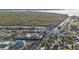 Aerial view showcasing the property's waterfront location, community, and natural surroundings at 4297 Nettle Rd, Port Charlotte, FL 33953