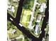 Aerial view of a waterfront property highlighting the canal front location and surrounding area at 4297 Nettle Rd, Port Charlotte, FL 33953