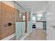 Elegant bathroom featuring a glass-enclosed shower, modern fixtures, and stylish vanity at 4297 Nettle Rd, Port Charlotte, FL 33953