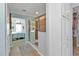 Well-lit bathroom featuring tile floors, and a glass shower adjacent to the bedroom at 4297 Nettle Rd, Port Charlotte, FL 33953
