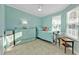 Bedroom featuring a trundle bed, and natural light from the window overlooking the property at 4297 Nettle Rd, Port Charlotte, FL 33953