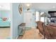 Inviting entryway featuring tile floors, calming paint color, and decorative nautical accents at 4297 Nettle Rd, Port Charlotte, FL 33953