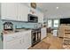 Modern kitchen featuring stainless steel appliances, ample cabinet space, and stylish countertops at 4297 Nettle Rd, Port Charlotte, FL 33953