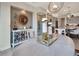 Dining room featuring a modern chandelier, decorative mirror, and stylish decor at 5221 Almar Dr, Punta Gorda, FL 33950