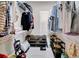 Walk-in closet with shelving and storage for shoes and clothing at 5221 Almar Dr, Punta Gorda, FL 33950