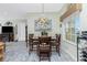 Dining room featuring neutral walls and wooden furniture at 8242 Lakeside Dr, Englewood, FL 34224