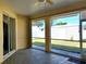 Screened in porch with view of the backyard at 1057 Staley St, Port Charlotte, FL 33952