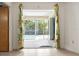 Patio view reveals sliding glass doors and access to backyard swimming pool at 1845 Edison Dr, Englewood, FL 34224