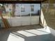 Enclosed screened porch with concrete floor at 2488 Warne St, Port Charlotte, FL 33952