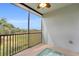 Relax on the screened patio with a ceiling fan, overlooking the green golf course at 14091 Heritage Landing Blvd # 121, Punta Gorda, FL 33955