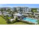 A stunning pool with lounge chairs and seating areas at 14091 Heritage Landing Blvd # 121, Punta Gorda, FL 33955