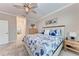Charming bedroom featuring nautical themed bedding and neutral colored walls at 15169 Spanish Point Dr, Port Charlotte, FL 33981
