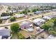 This aerial view showcases the property with a pool, shed, and trampoline, all within a fenced yard at 21354 Austin Ave, Port Charlotte, FL 33952