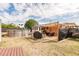 This backyard features a pool, outdoor grill and shade with lots of space at 21354 Austin Ave, Port Charlotte, FL 33952