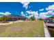 Spacious backyard features a screened in lanai and a private boat dock at 4122 Library St, Port Charlotte, FL 33948